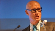 Image of professor Swinburn speaking