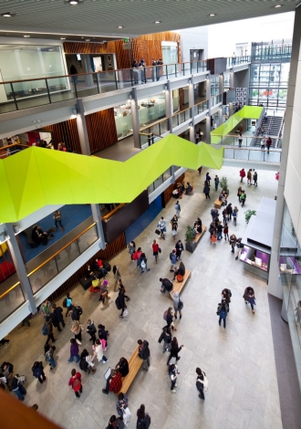 Students in the atrium of the Faculty of Medical and Health Sciences